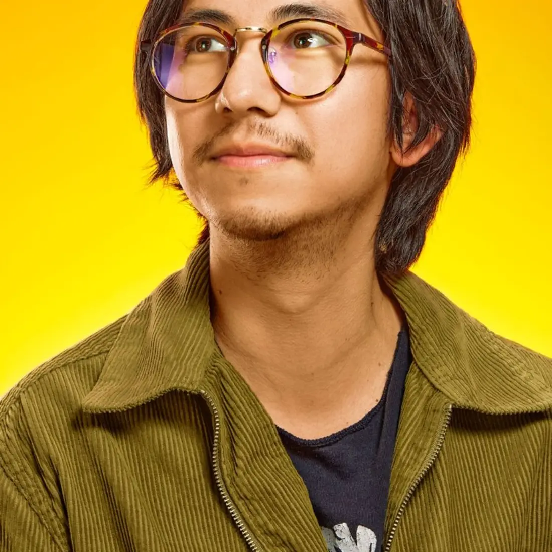 A photo portrait of artist Miguel Almeida.