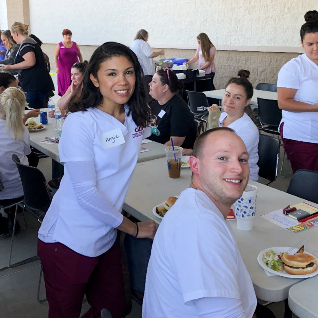Students attending a barbecue hosted by Saint Alphonsus Aug. 27, 2019