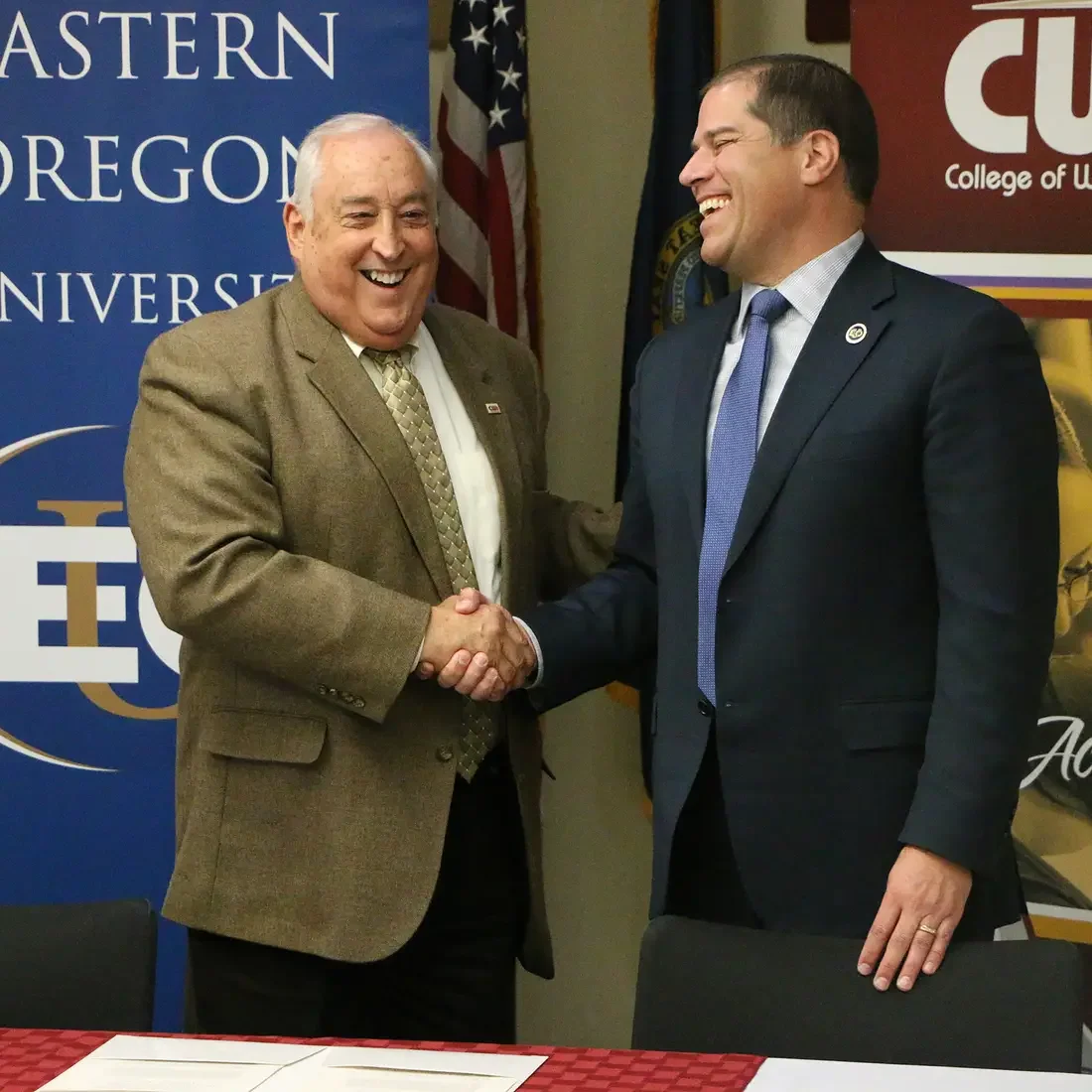 College of Western Idaho President, Bert Glandon, left, and Eastern Oregon University President, Tom Insko, after signing an articulation agreement between the two schools on Monday, Nov. 6. 2017, in Nampa, Idaho.