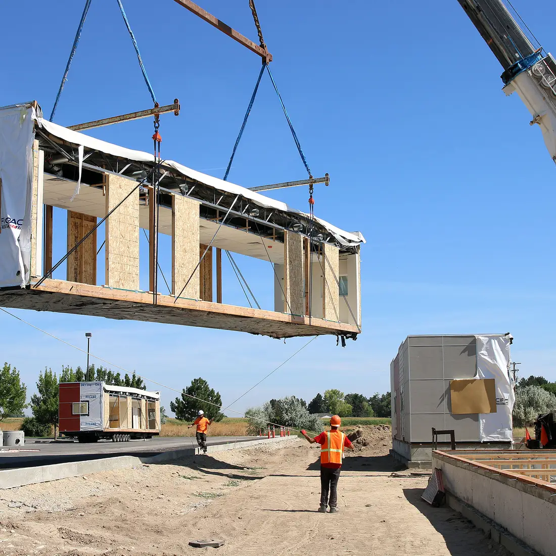 A crew from Pacific Modular Structures install buildings at the Nampa Campus on Wednesday Aug. 14.