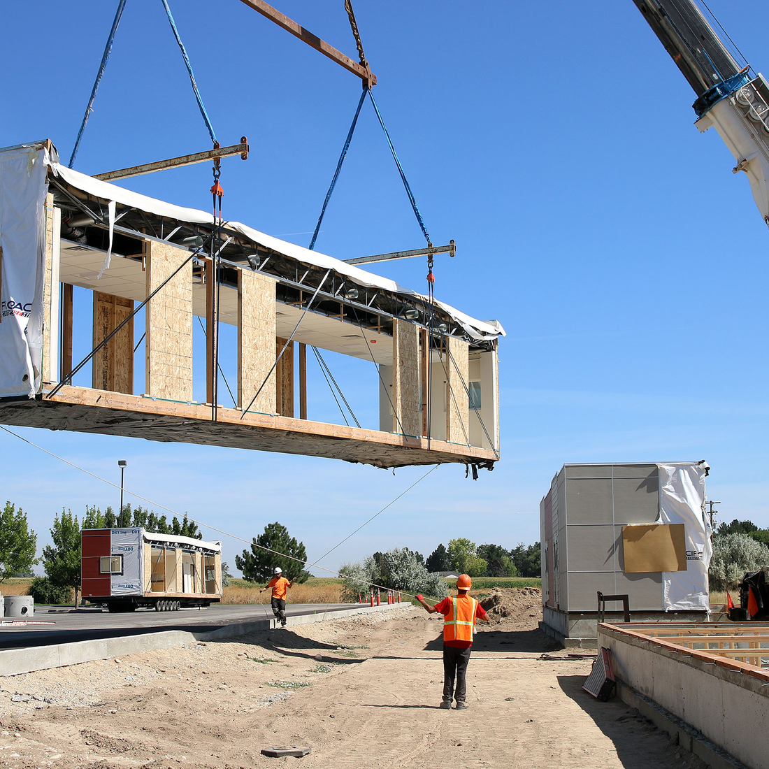 A crew from Pacific Modular Structures install buildings at the Nampa Campus on Wednesday Aug. 14.