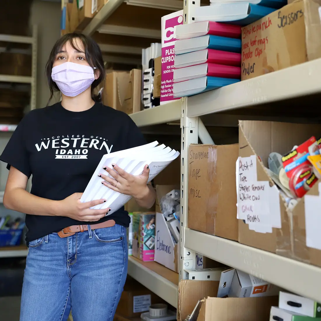 Gabby Minor, a work-study at CWI's bookstore, pauses before delivering books during her shift on Thursday, Sept. 3.