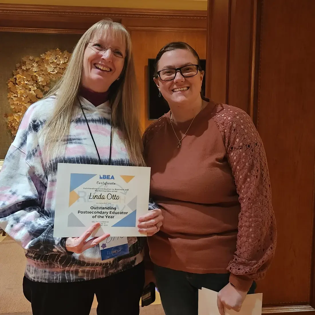 Linda Otto posing with her award
