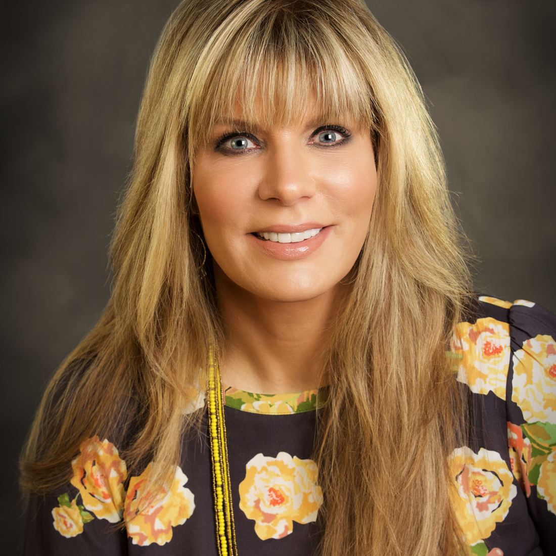 Portrait of woman with long blonde hair