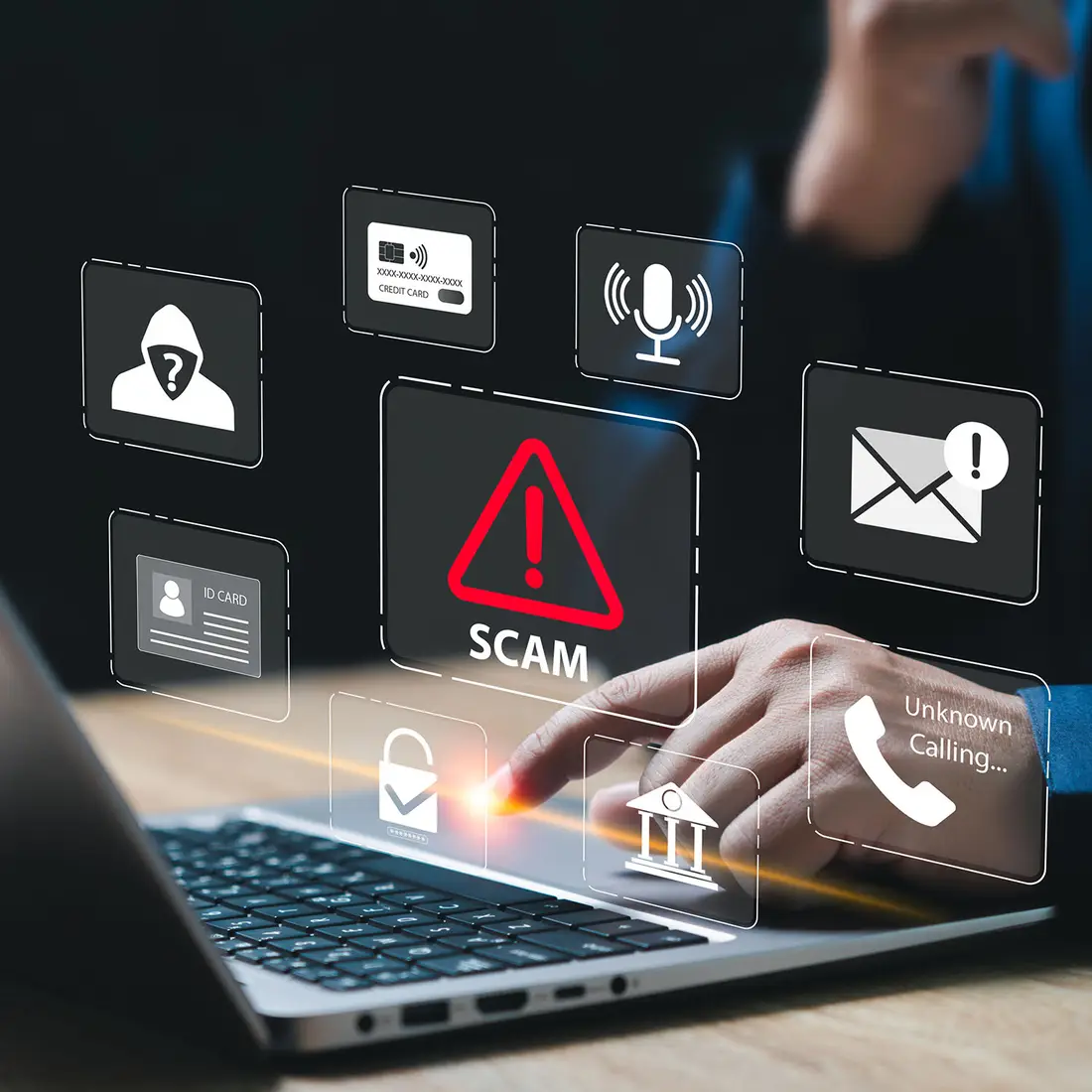 A graphic showing a laptop with cybercrime icons hovering above the keyboard.