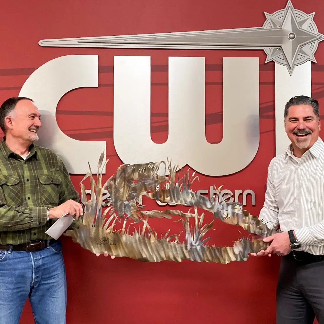 Rick Babcock, left, alongside Jeff Flynn, at his farewell party hosted by Facilities Planning and Management