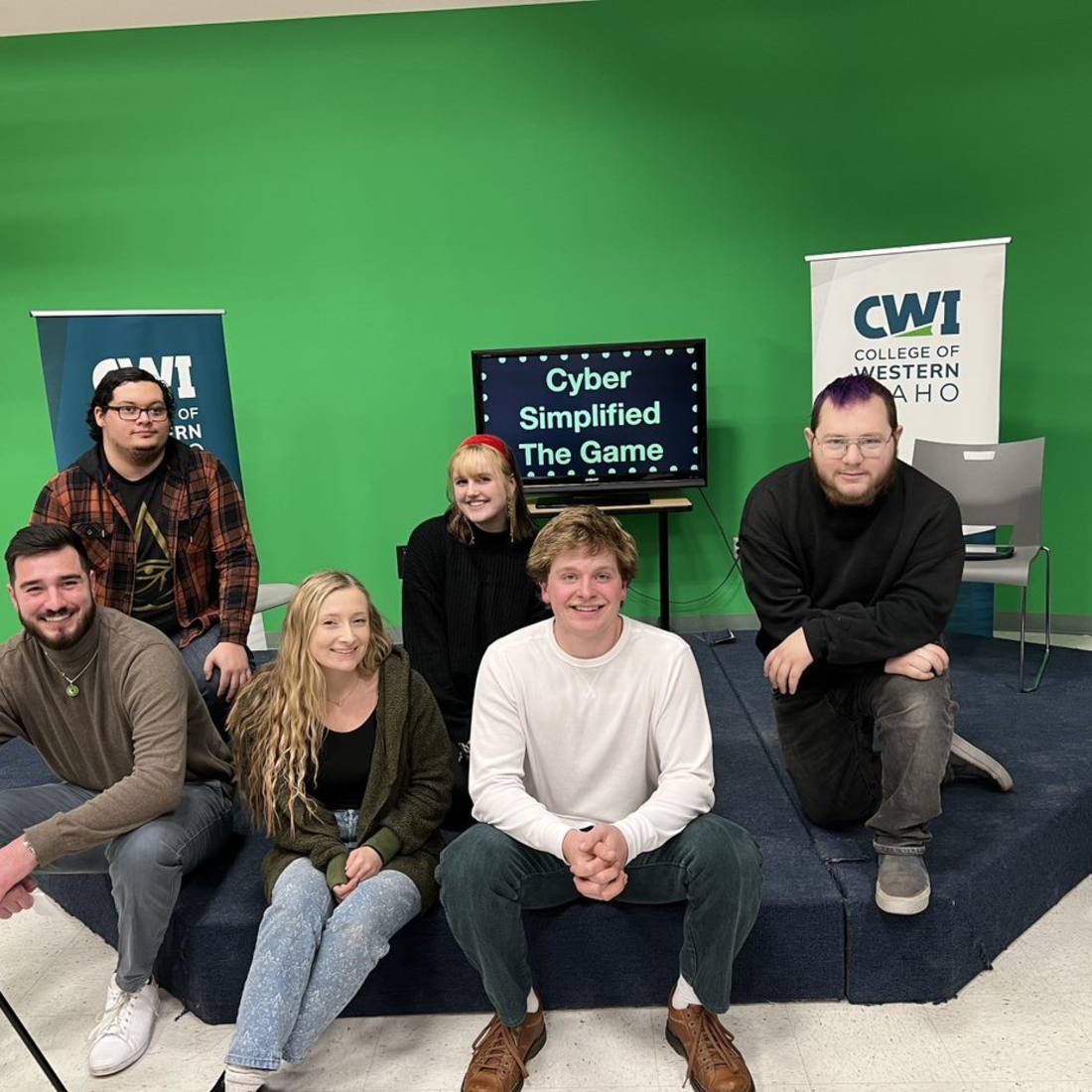 CWI Multimedia class sitting in front of game show set