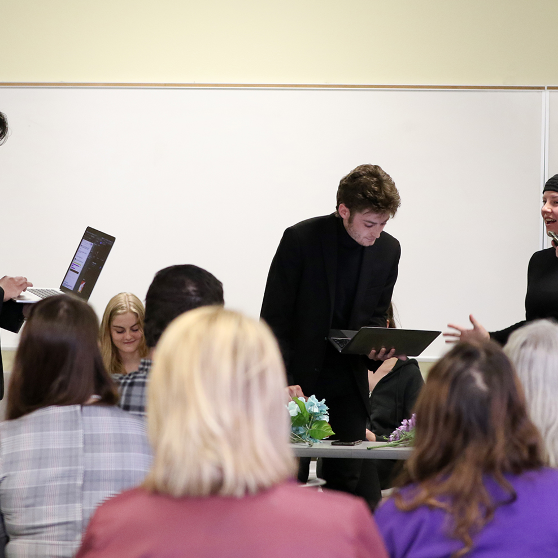 Students presenting a readers theater presentation in a classroom