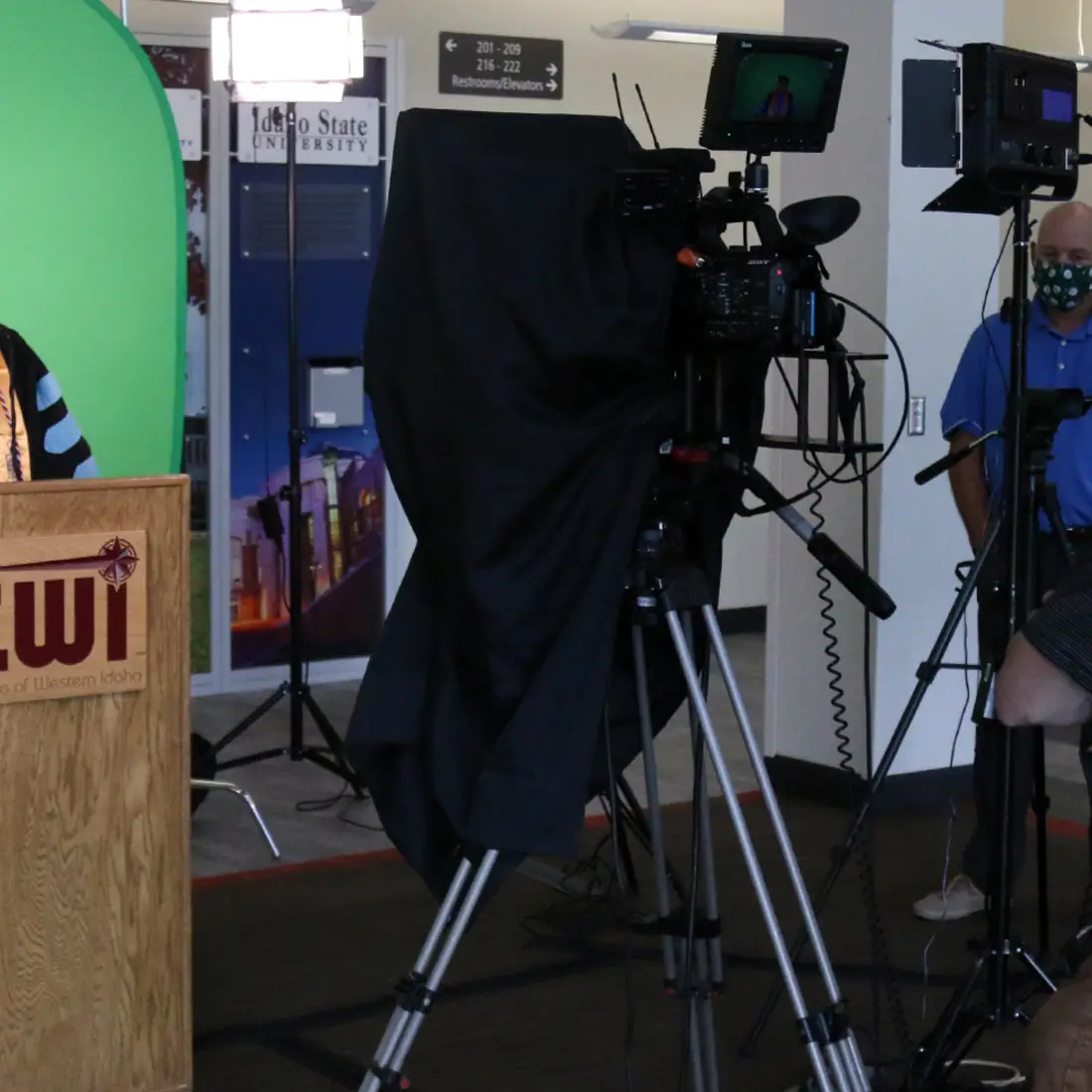 Behind the scenes view Bert recording a portion of the College's 2020 virtual commencement ceremony