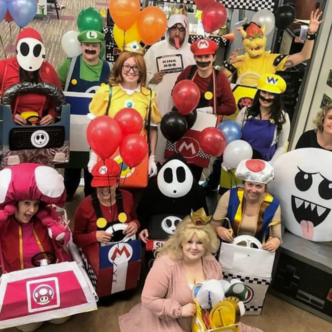 Members of the Students Affairs team dressed up on Halloween as characters from Mario Cart.