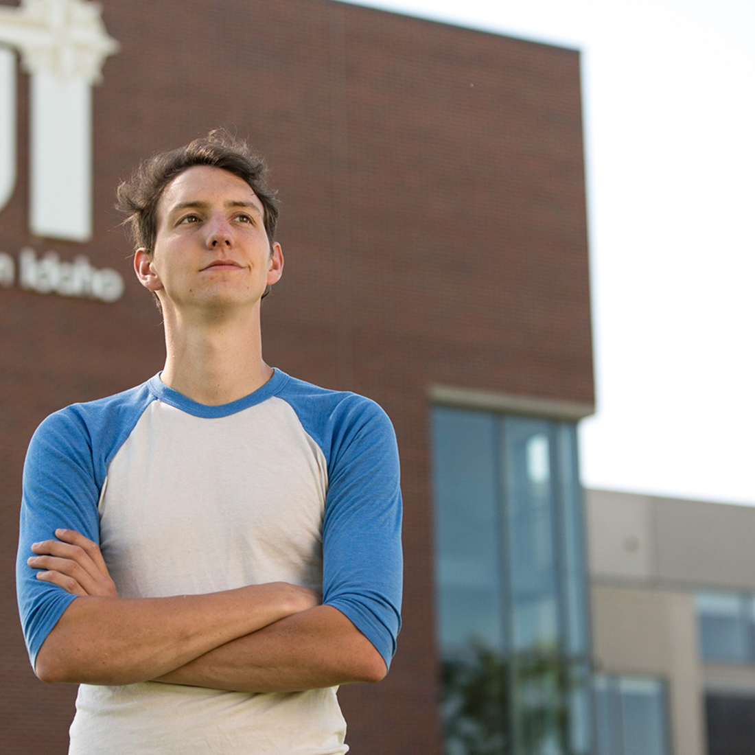 Student standing outside the Nampa Campus Academic Building