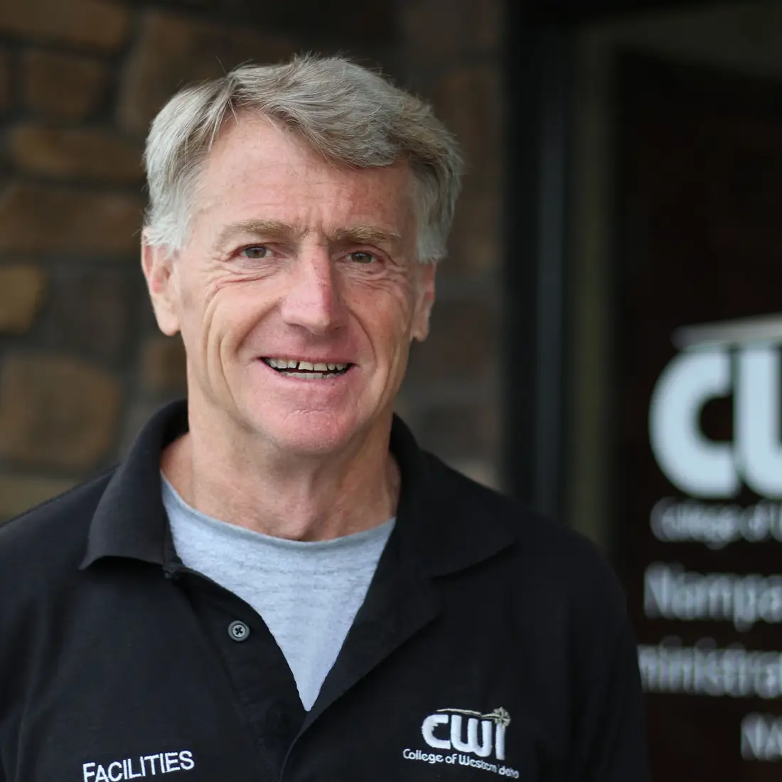 David outside a CWI building