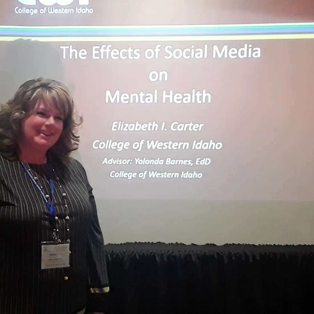 Elizabeth Carter presenting research on effects of social media on mental health