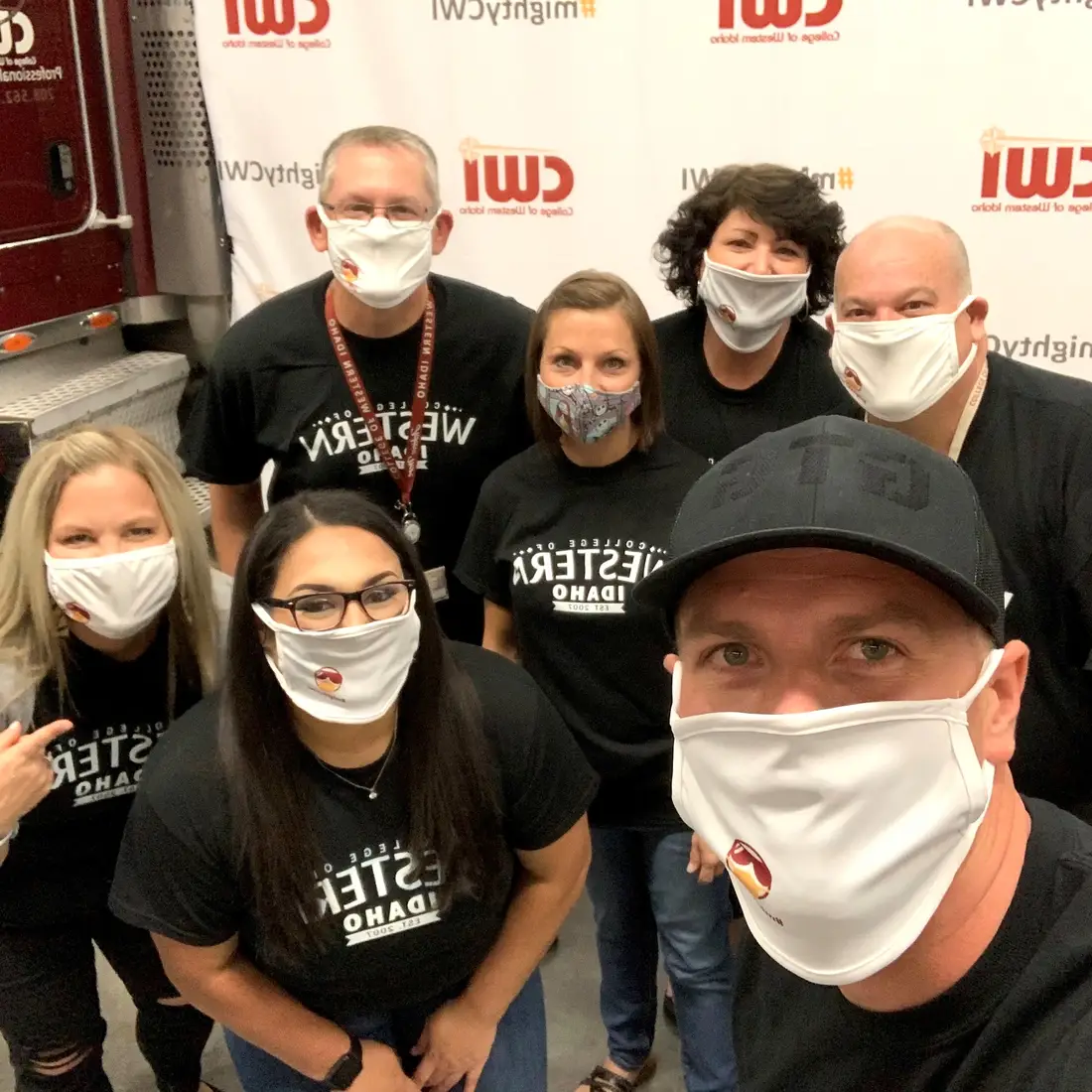 Employees and alumni wearing CWI shirts at the 2020 Opening Doors Benefit Event