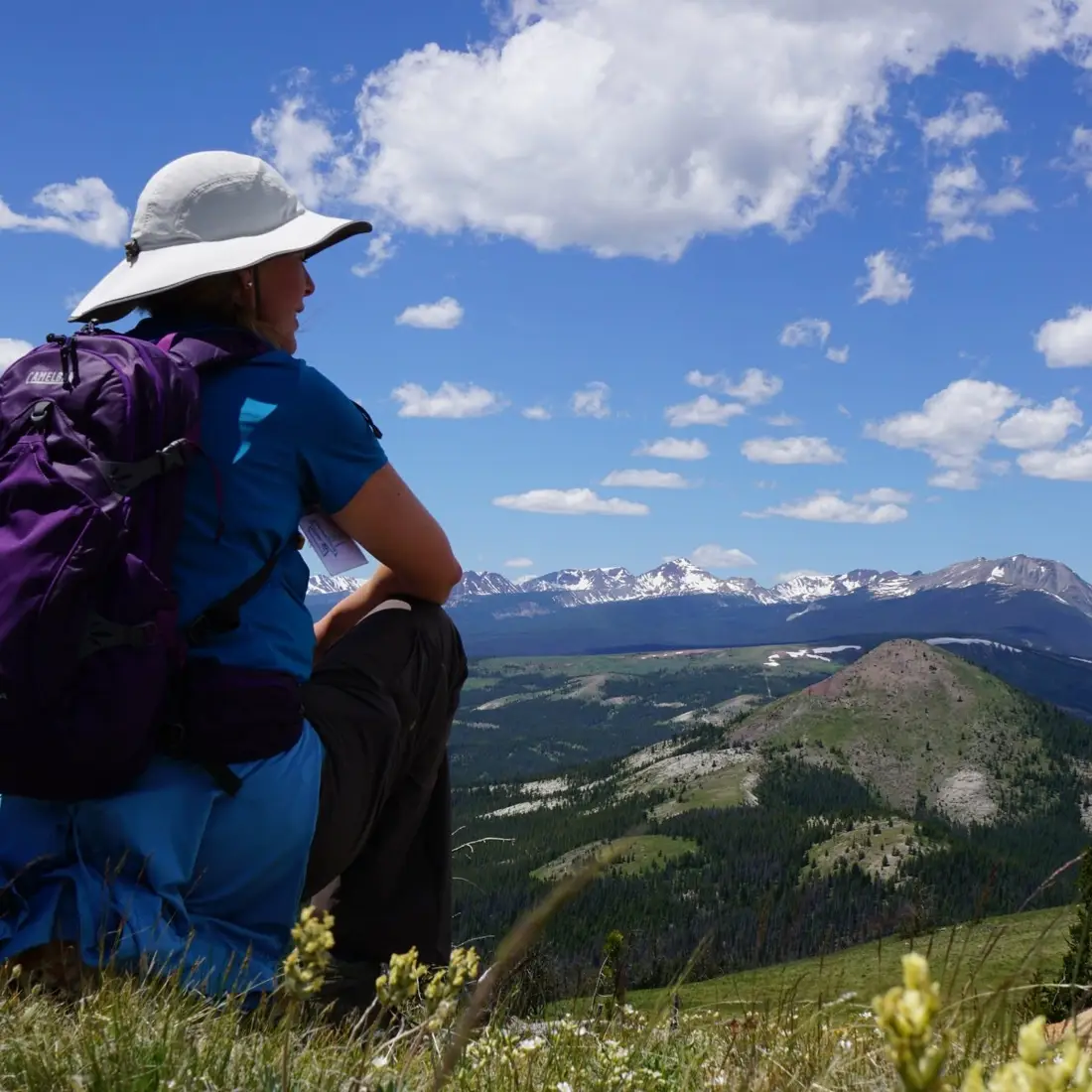 Michelle Fellows at the top of a mountain