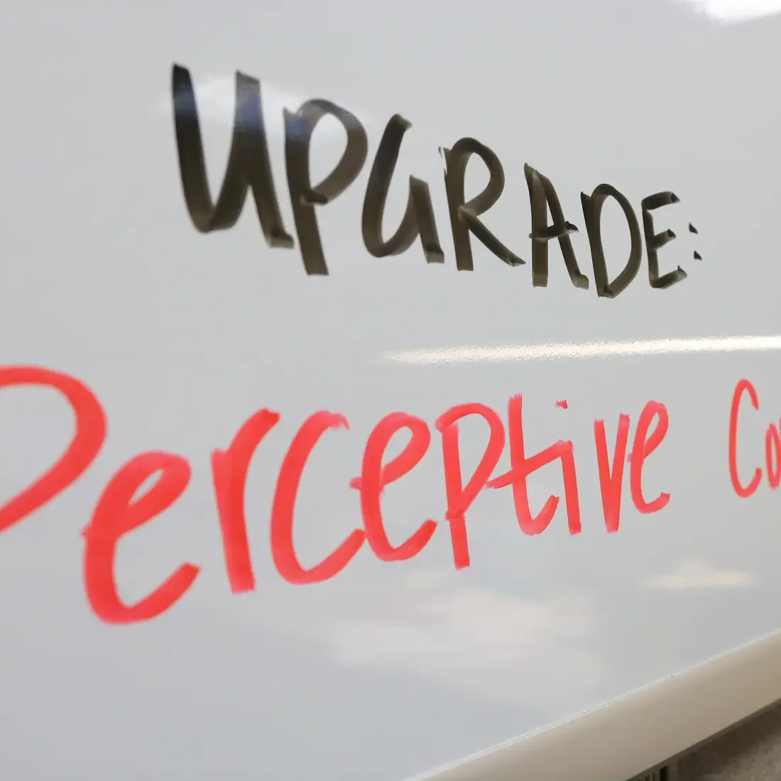 Upgrade: Perceptive Content written on a white board