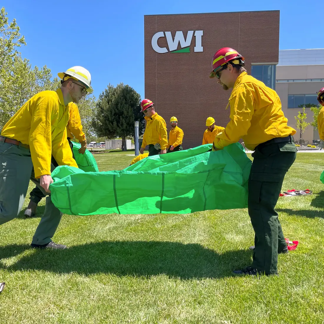 Wildland fire recruits training outside the Nampa Campus Academic Building