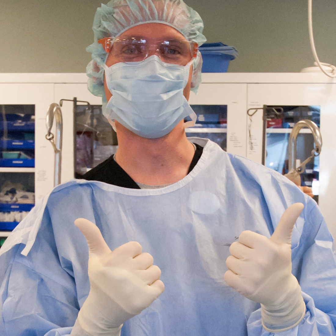 Surgical Technology student giving a thumbs up. 