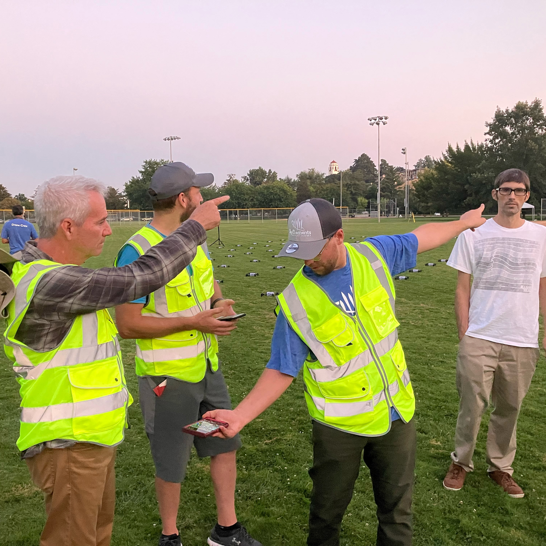 CWI students and alumni working together to set up drones