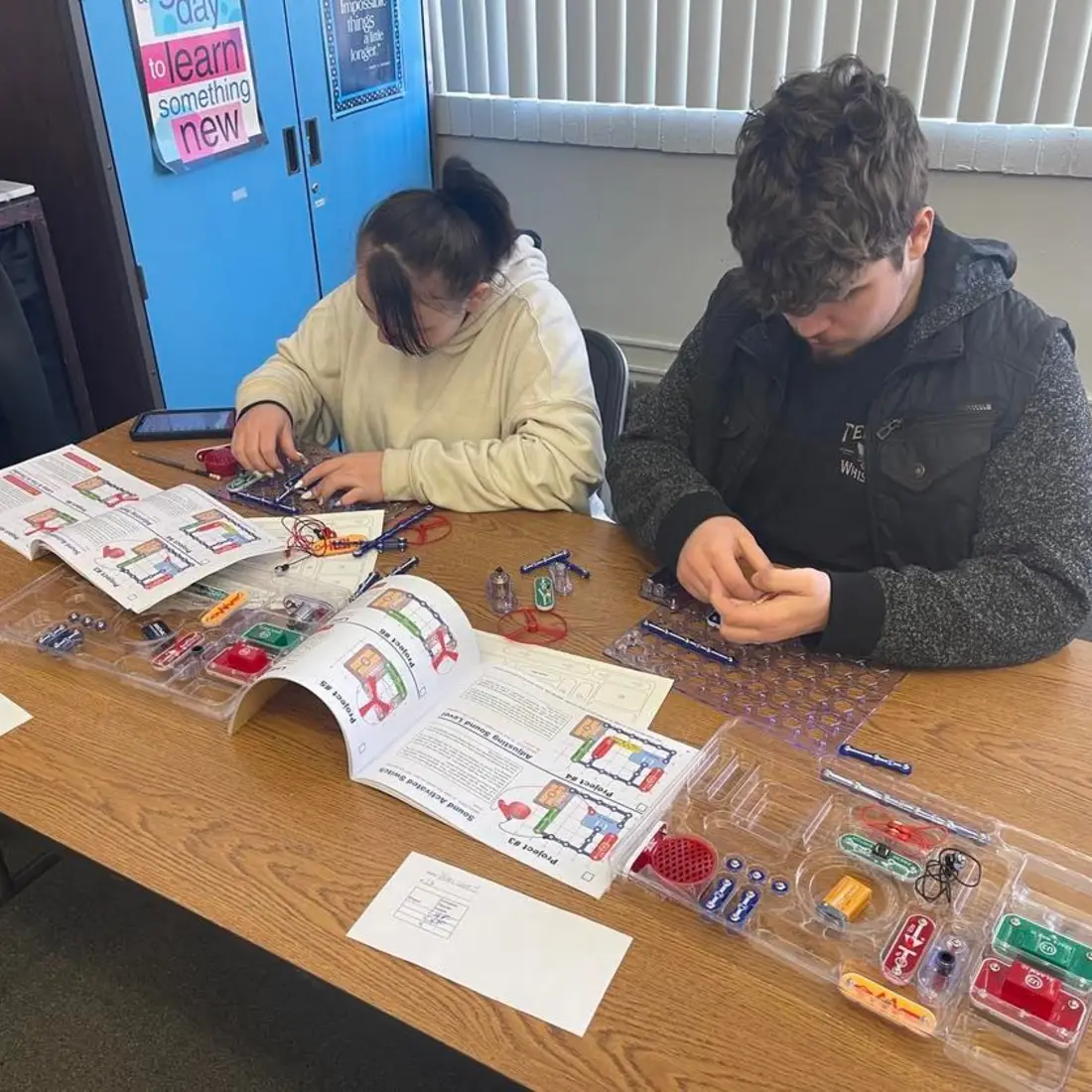 Students working on activities from Pop the Trunk 