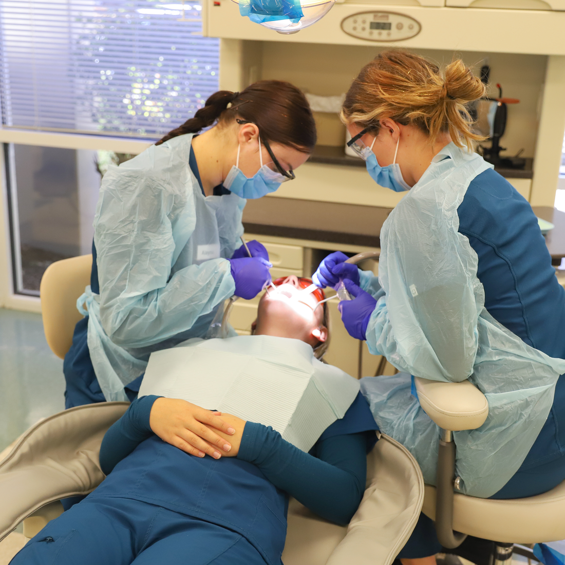 Dental assistant students in lab