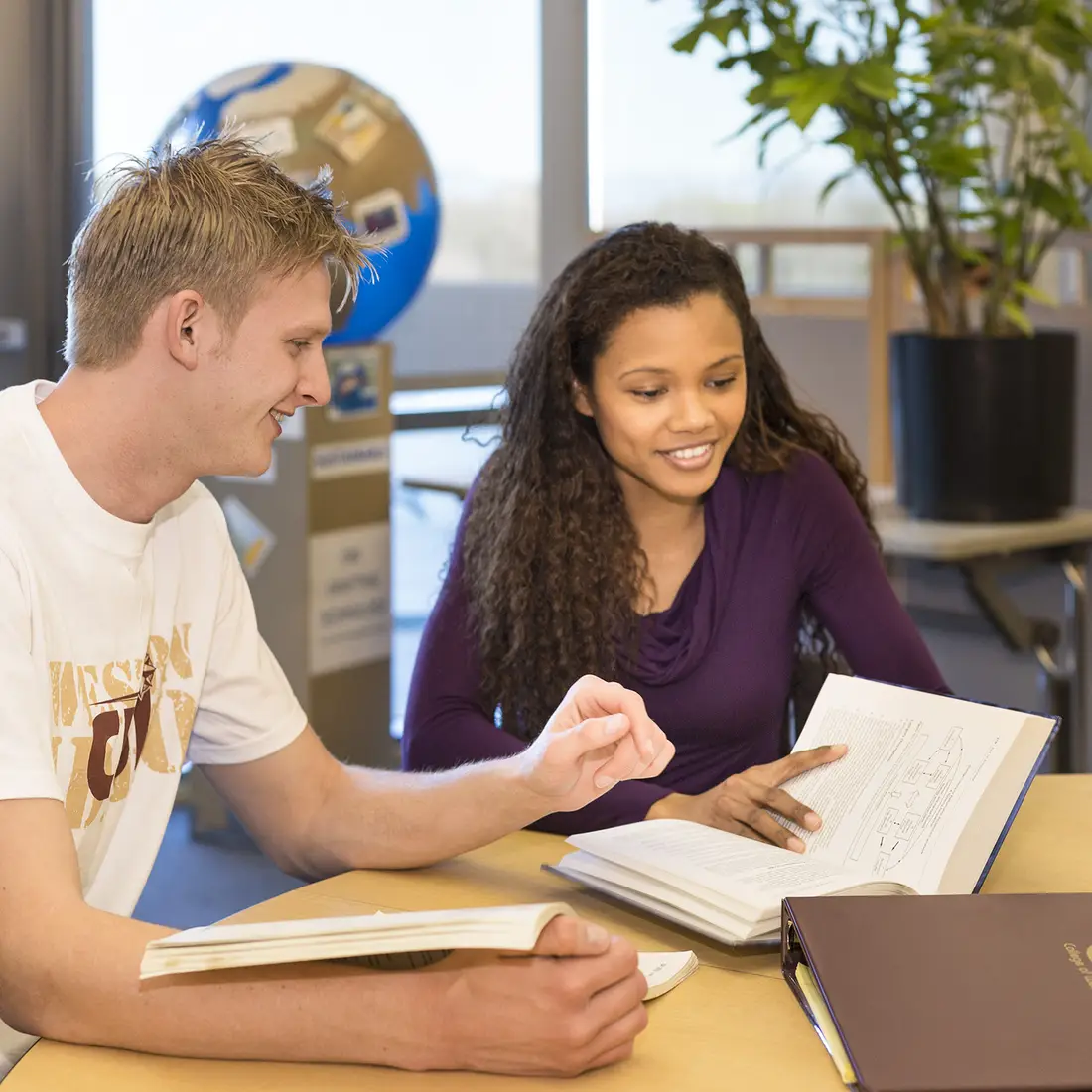 Students studying at table