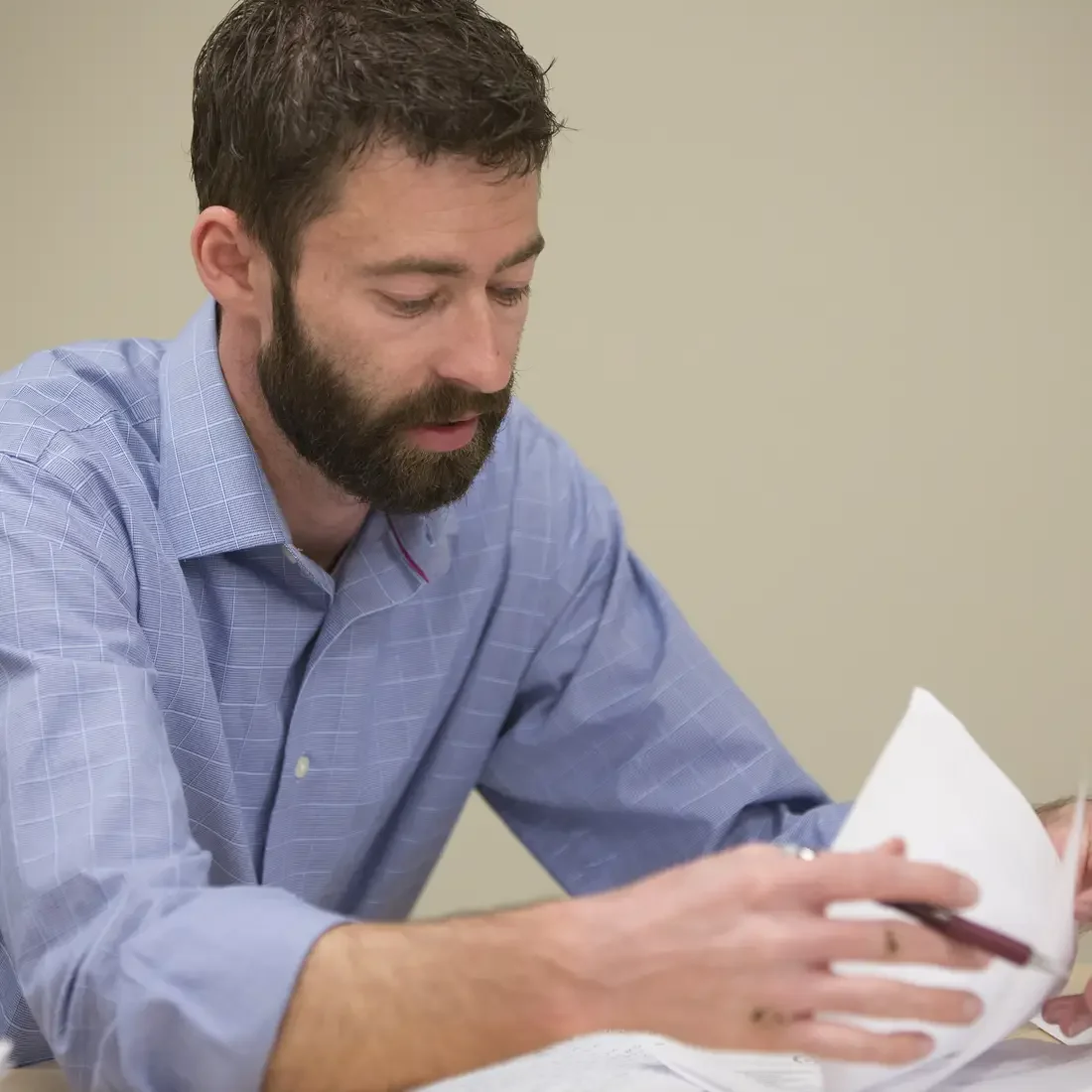 Faculty reviewing papers