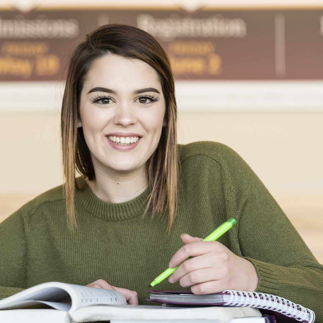 female student on campus studying