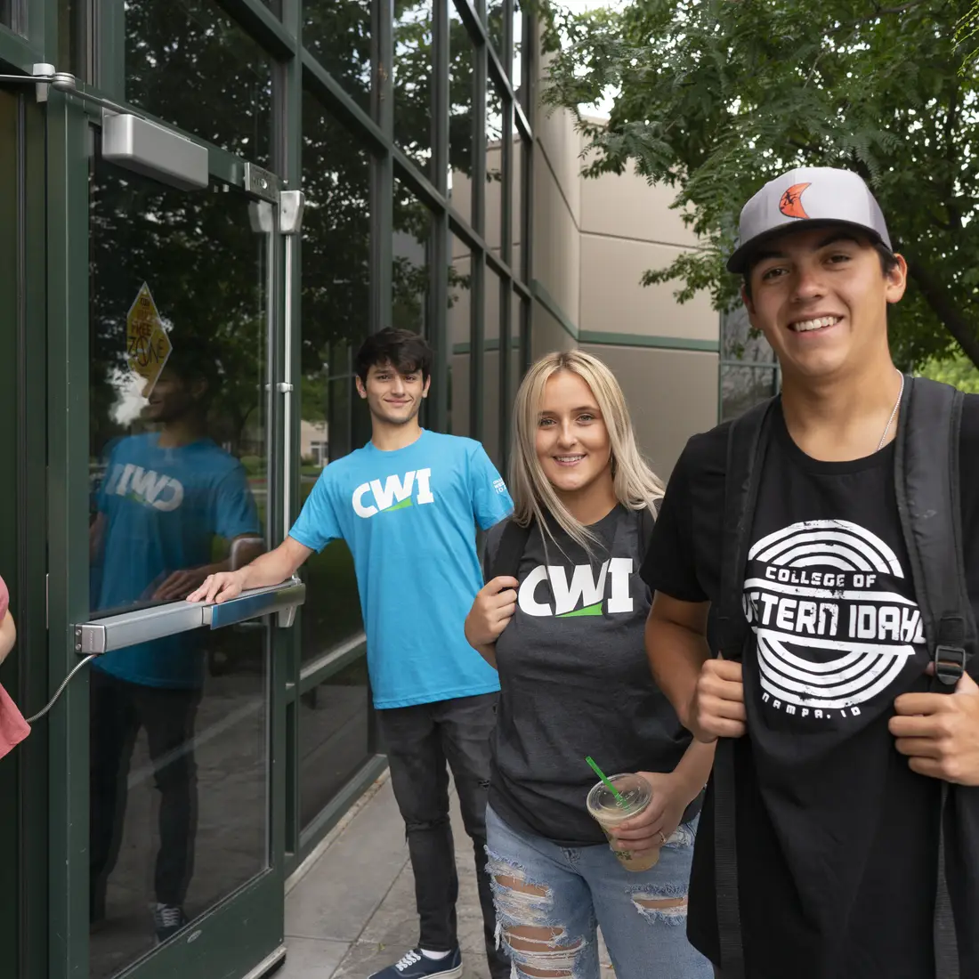Students about to walk into a campus building