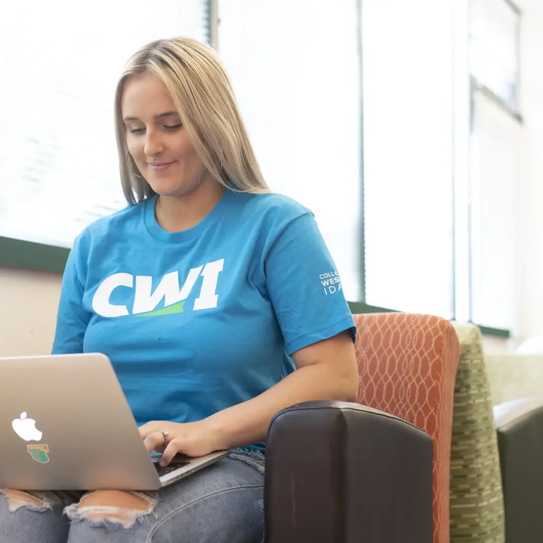 CWI student working on computer