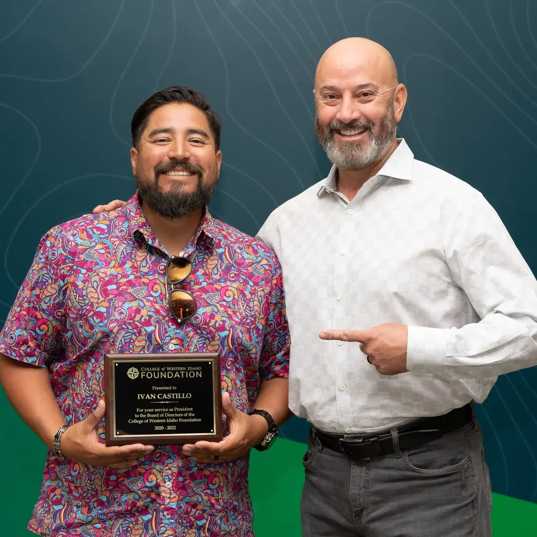 Ivan Castillo, former Foundation Board President, left, with incoming President, Mike Peña