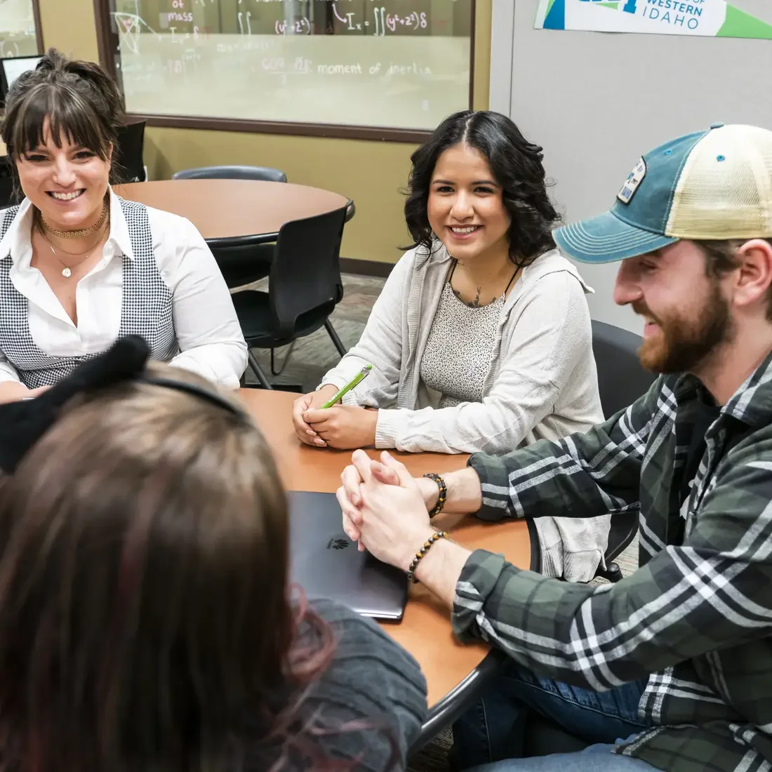 Students gathered around a table