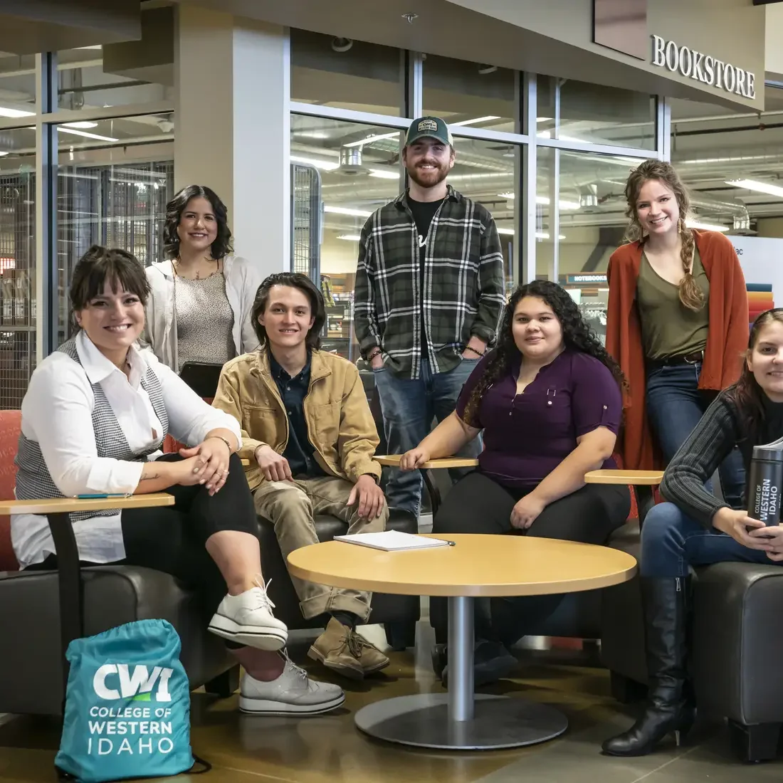 Group of students sitting in the Nampa Campus Micron Education Center lobby