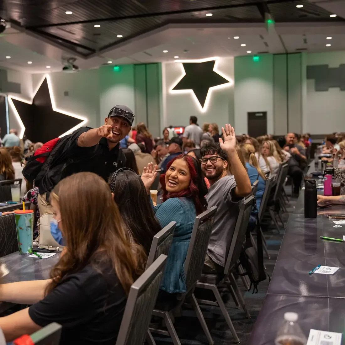 CWI Employees smiling and looking at the camera at an event