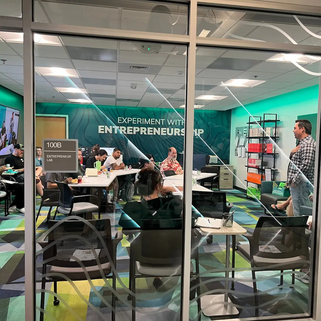 Students in the CWI Entrepreneur Lab listen to a speaker during a workshop