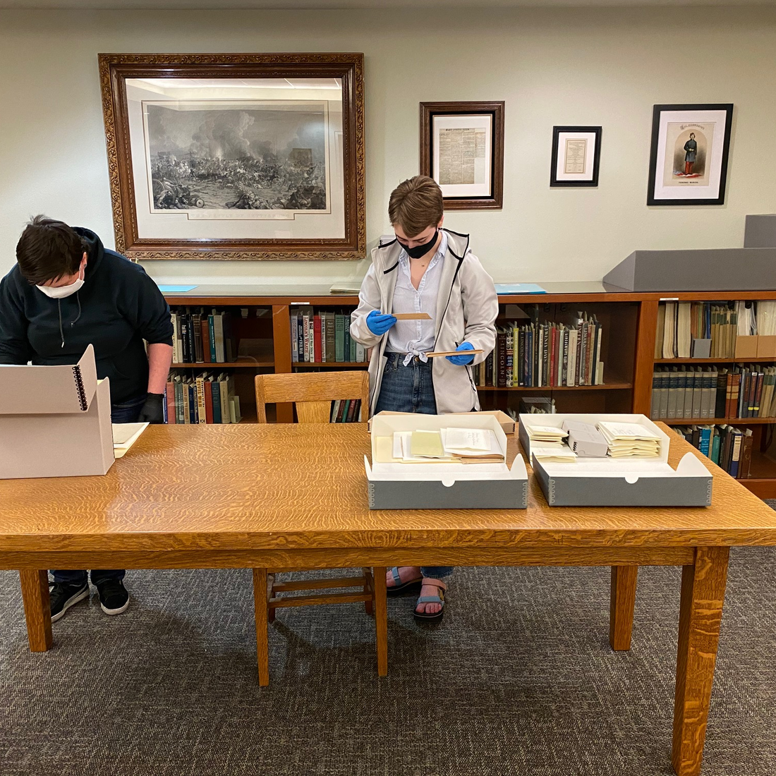 History Capstone class students from CWI searching Idaho State Archives