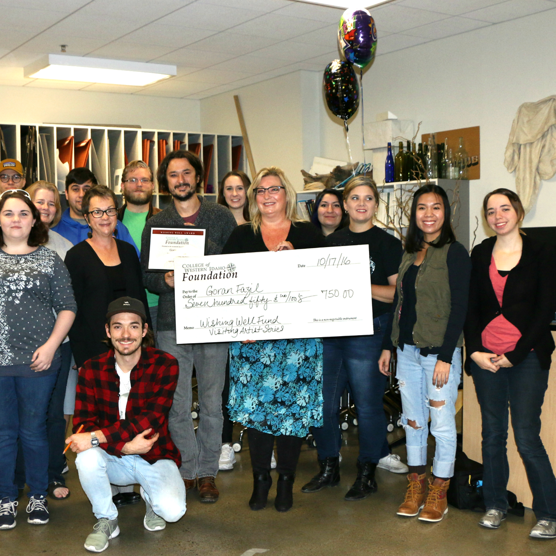 CWI employees and supportive community partners.