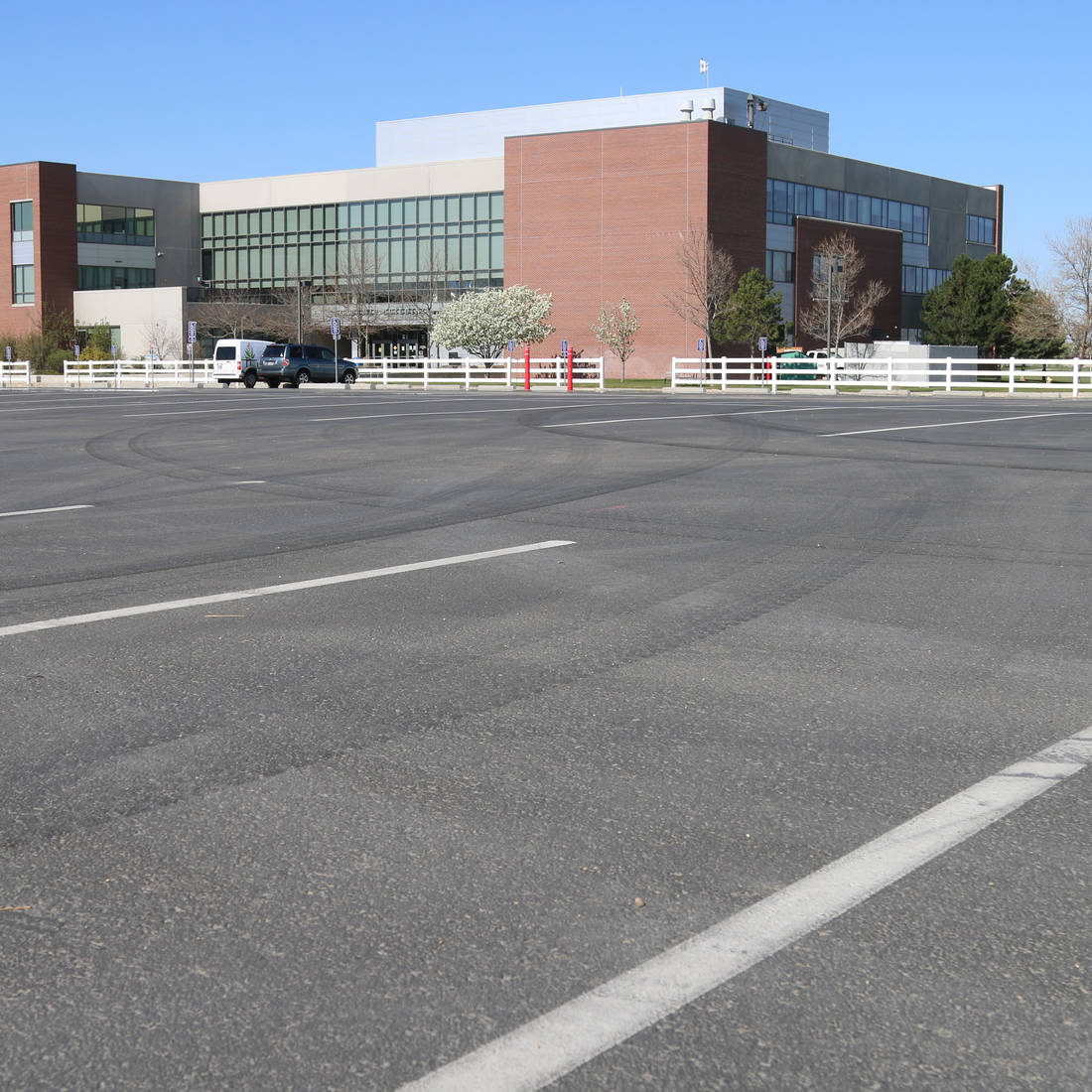 Cars in the parking lot at the Nampa Campus Academic Building
