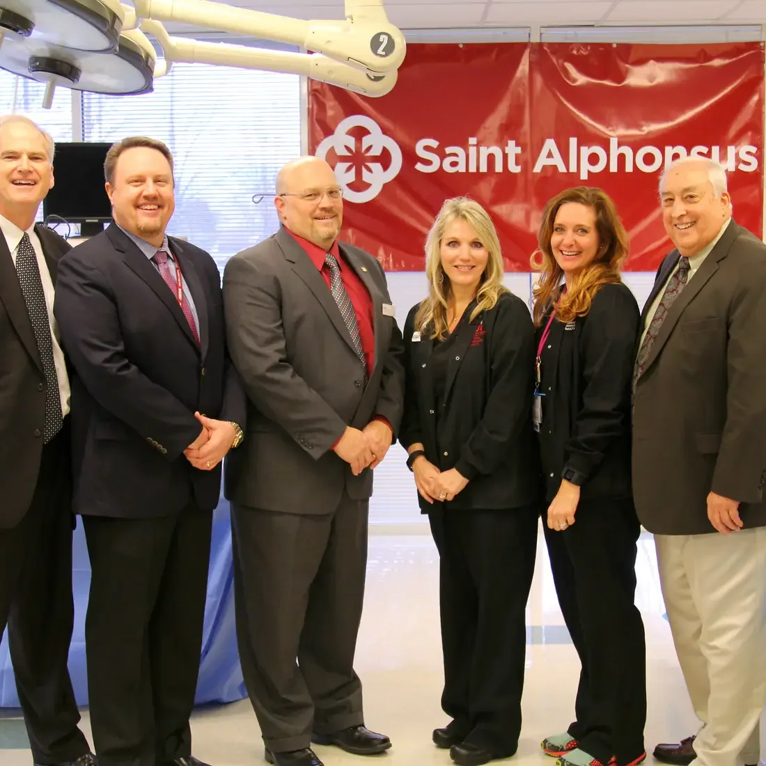 Saint Alphonsus Regional Medical Center and CWI representatives in classroom.