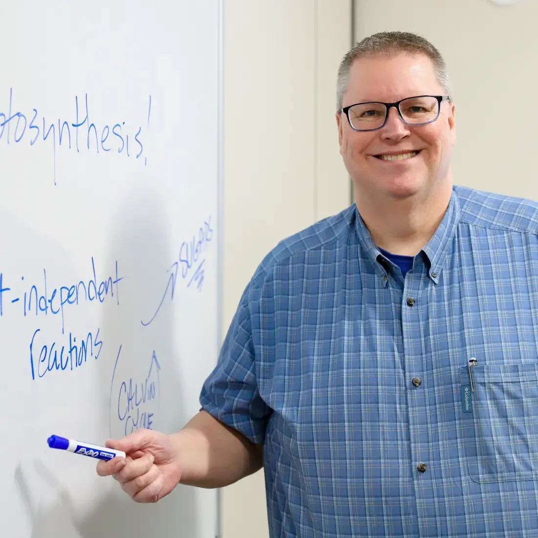 Gary Heller in front of whiteboard