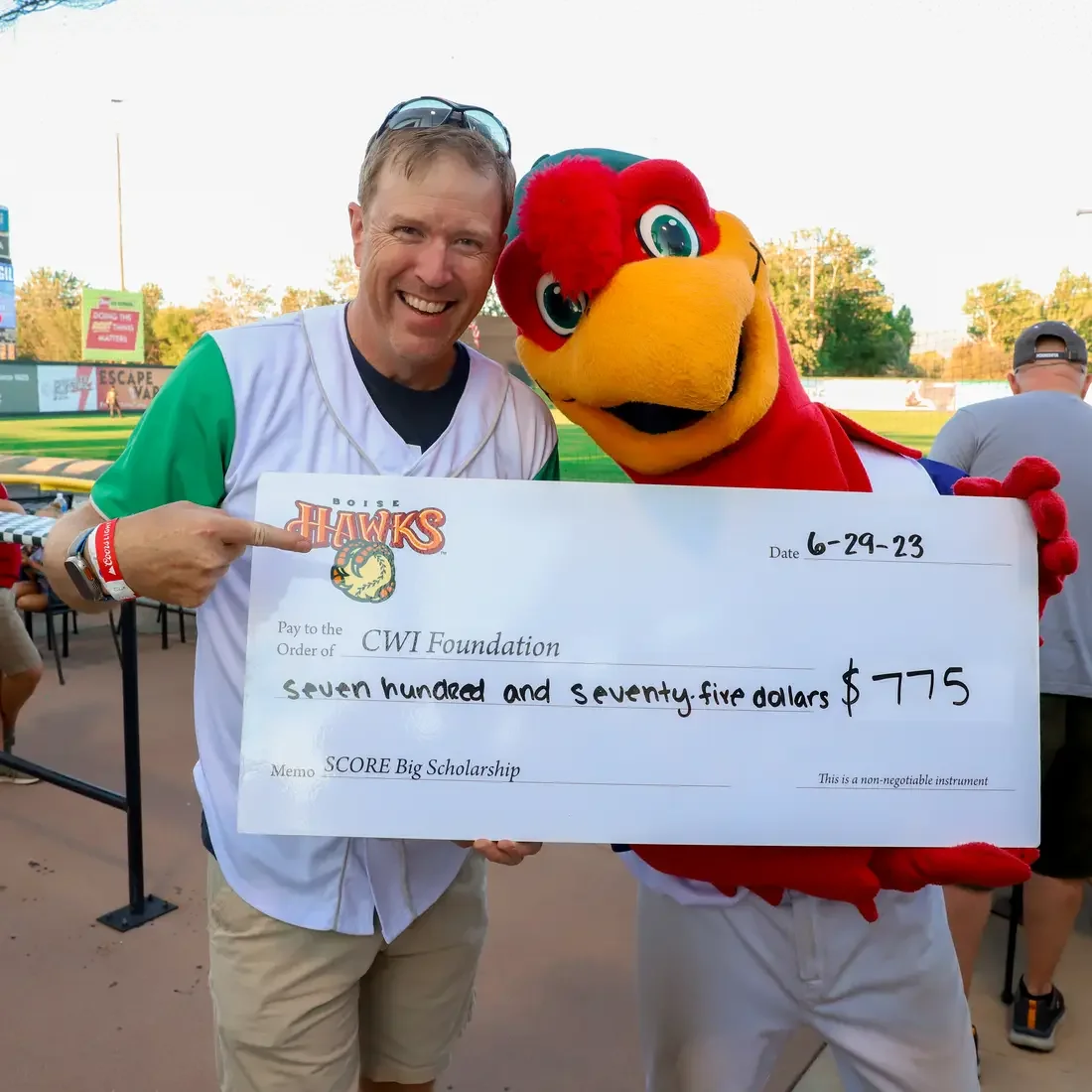 President Gordon Jones and Humprey the Hawk