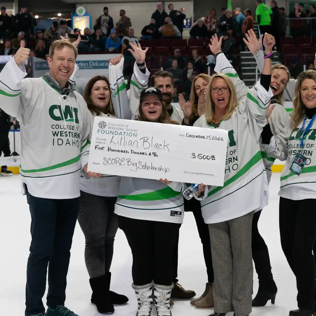 CWI staff, leadership, and students on the ice at Steelheads game