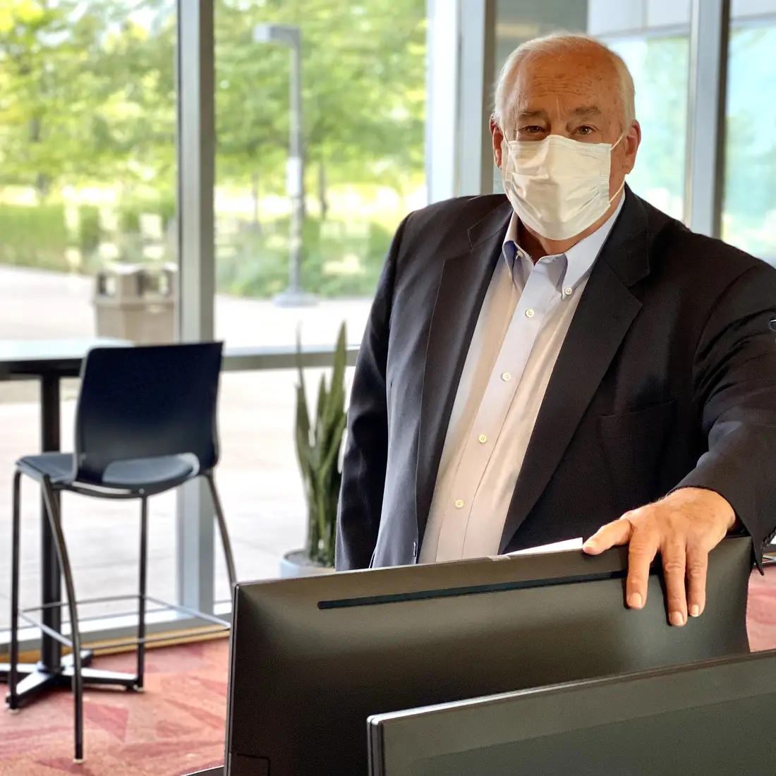 President Bert Glandon on campus wearing a mask