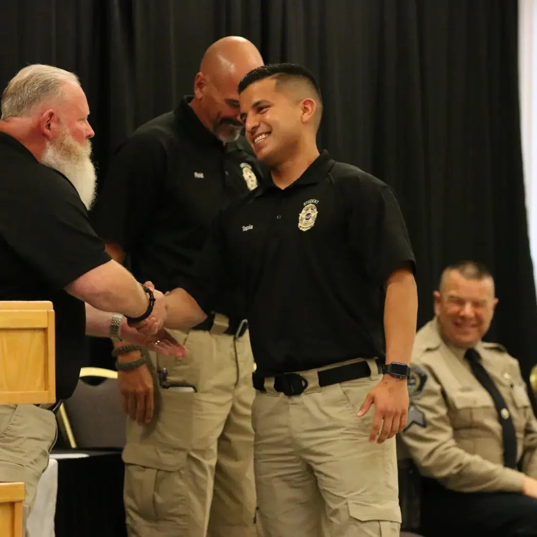 Law Enforcement students celebrate graduation with family and friends during a ceremony on May 16.