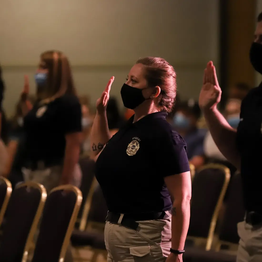 Law Enforcement graduates pledging to follow the Law Enforcement Code of Ethics 