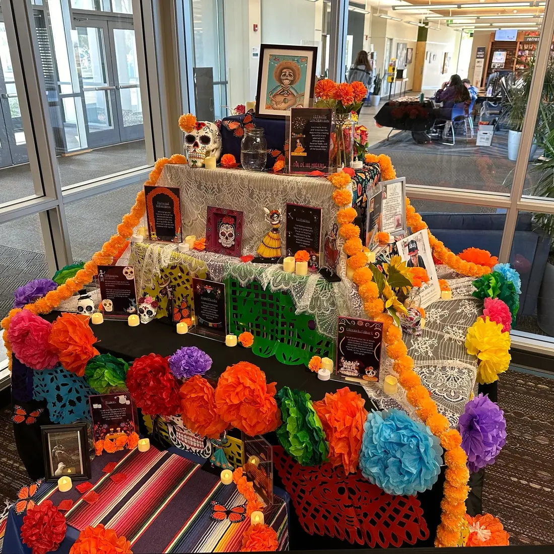 An alter display for Dia de los Muertos placed in lobby.