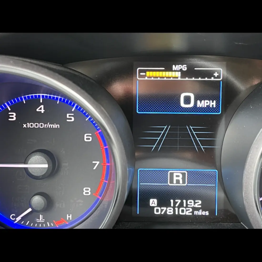 Dash of a vehicle showing mileage
