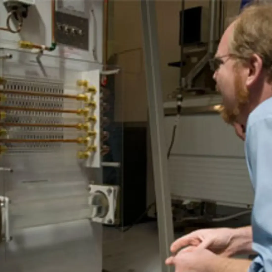 Student studying instruments in lab