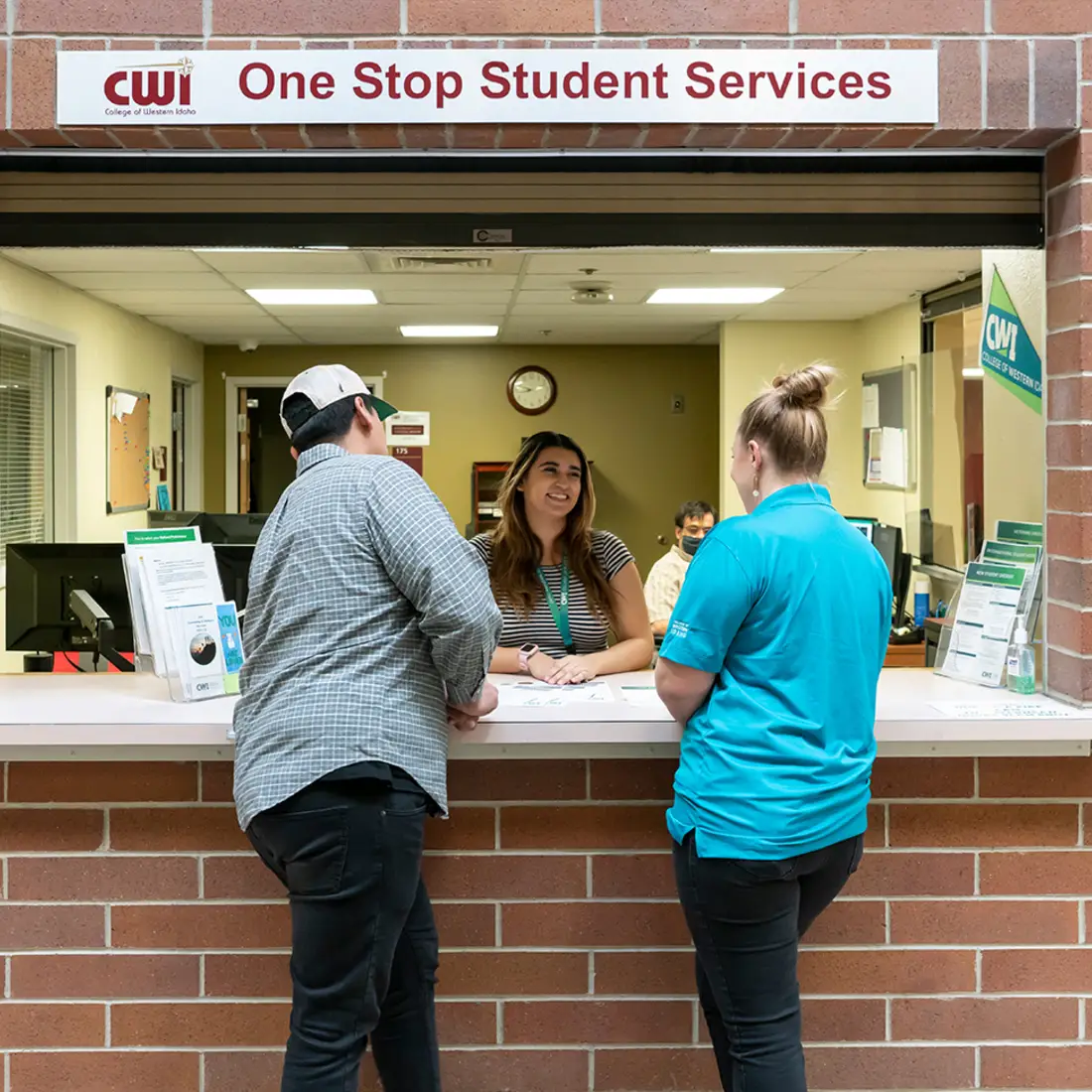 Two students visiting a One Stop location