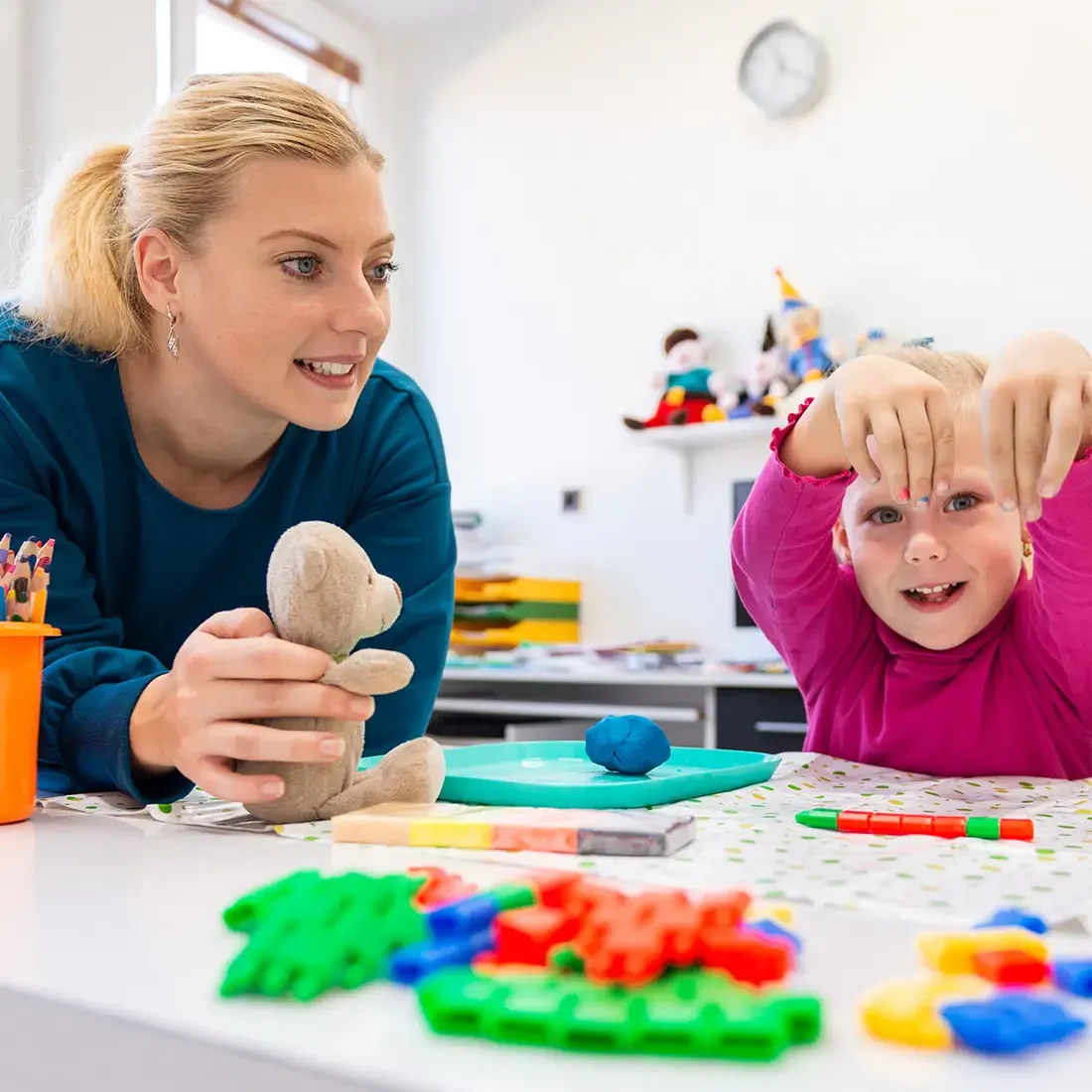 Occupational therapy assistant working with a child
